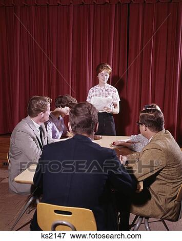 1960S 6 Teen Students Conference Table Girl Speaker Meeting Group Discussion Student Government Red Velvet Curtain View Large Photo Image Stock Photo - 1960S 6 Teen Students Conference Table Girl Speaker Meeting Group Discussion Student Government Red Velvet Curtain. Fotosearch