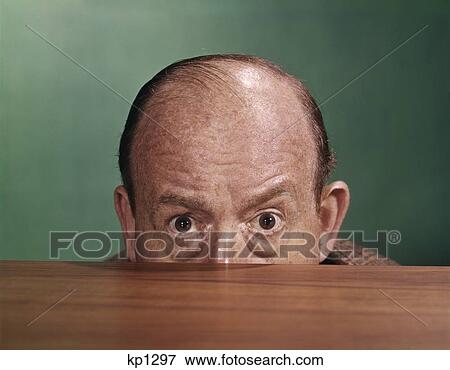 1960S Balding Man Peeking Over Desktop With Only Top Half Of Head Showing View Large Photo Image Stock Photo - 1960S Balding Man Peeking Over Desktop With Only Top Half Of Head Showing. Fotosearch