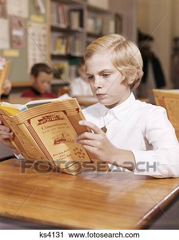 1960S Blonde Girl Reading Book At Desk In Classroom View Large Photo Image Stock Image - 1960S Blonde Girl Reading Book At Desk In Classroom. Fotosearch