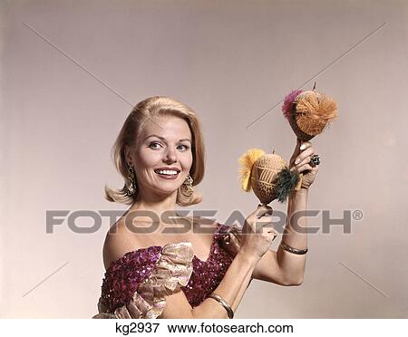 1960S Blonde Woman In Caribbean Costume Shaking Maracas View Large Photo Image Stock Photo - 1960S Blonde Woman In Caribbean Costume Shaking Maracas. Fotosearch