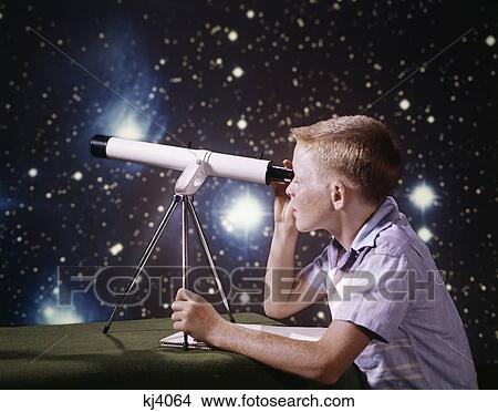 Picture - 1960S Boy With Telescope On Table Looking At Star Night Sky With Stars Galaxy Nebula Imagination Learning. Fotosearch