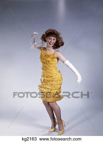 1960s brunette woman in fringed dress stock image kg2163