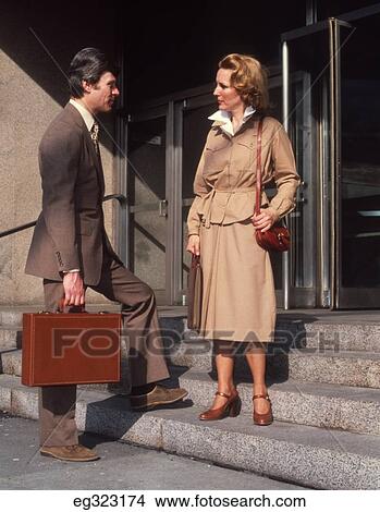 1960S Business Man & Woman Talking On Front Steps Office View Large Photo Image Picture - 1960S Business Man & Woman Talking On Front Steps Office. Fotosearch