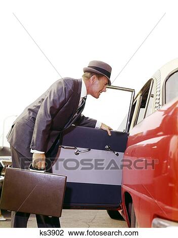 1960S Businessman Man With Briefcase Get Into Open Door Red White Taxi Checker Cab Business Sales Travel Retro Vintage View Large Photo Image Stock Image - 1960S Businessman Man With Briefcase Get Into Open Door Red White Taxi Checker Cab Business Sales Travel Retro Vintage. Fotosearch