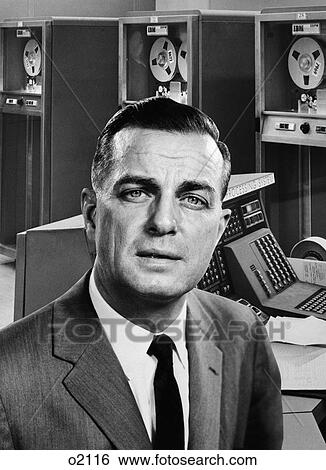 1960S Businessman Portrait Superimposed On Background Of Large Computer System View Large Photo Image Stock Photograph - 1960S Businessman Portrait Superimposed On Background Of Large Computer System . Fotosearch