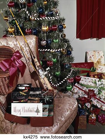 1960'S Christmas Tree With Presents Fishing Pole Reel Tackle Box Creel Indoor Studio Colorful Decorations Hobby View Large Photo Image Stock Photography - 1960'S Christmas Tree With Presents Fishing Pole Reel Tackle Box Creel Indoor Studio Colorful Decorations Hobby. Fotosearch