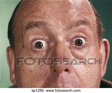 1960S Close-Up Detail Of Florid Man Face With Eyes Open Wide And Staring View Large Photo Image Stock Photography - 1960S Close-Up Detail Of Florid Man Face With Eyes Open Wide And Staring. Fotosearch