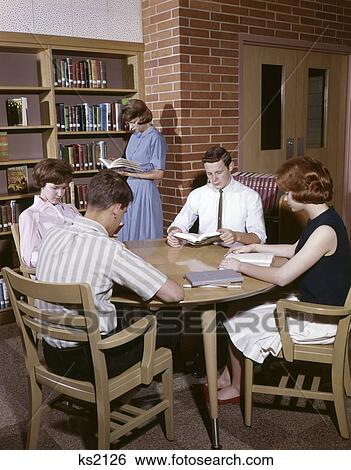 1960S College Students Studying In Library Nostalgia Boy Girl Man Woman Adolescent View Large Photo Image Stock Photograph - 1960S College Students Studying In Library Nostalgia Boy Girl Man Woman Adolescent . Fotosearch