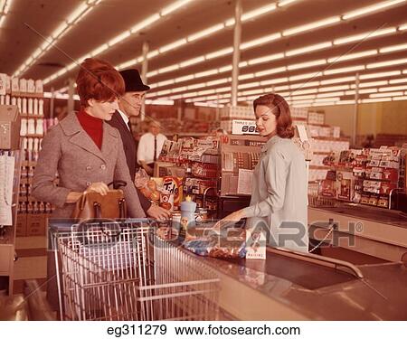1960S Couple At Check Out Counter Of Supermarket View Large Photo Image Stock Photo - 1960S Couple At Check Out Counter Of Supermarket. Fotosearch