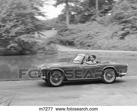 1960S Couple Driving In Convertible View Large Photo Image Stock Photo - 1960S Couple Driving In Convertible . Fotosearch