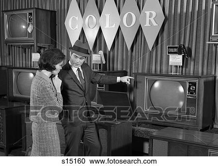 1960S Couple Shopping For Color Tv'S View Large Photo Image Stock Image - 1960S Couple Shopping For Color Tv'S . Fotosearch