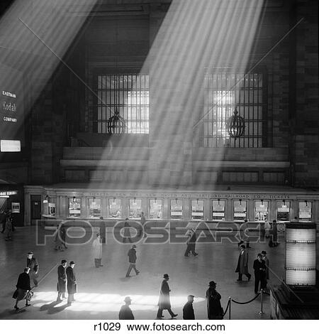1960S Crowd Walking Past The Sunbeams Coming Through The Atrium Of Grand Central Station Maganificent Dramatic Poetic Cavernous View Large Photo Image Stock Photo - 1960S Crowd Walking Past The Sunbeams Coming Through The Atrium Of Grand Central Station Maganificent Dramatic Poetic Cavernous. Fotosearch