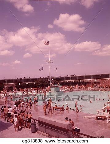 Stock Photo - 1960S Crowded Public Swimming Pool. Fotosearch