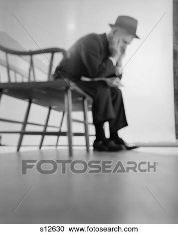 1960S Elderly Man Sitting On Bench Leaning Forward Elbows On Knees Head In Hands Depression Suit Hat Sick Ill Silhouette View Large Photo Image Stock Image - 1960S Elderly Man Sitting On Bench Leaning Forward Elbows On Knees Head In Hands Depression Suit Hat Sick Ill Silhouette. Fotosearch