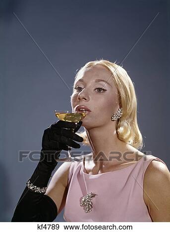 https://fscomps.fotosearch.com/compc/CLT/CLT004/1960s-elegant-woman-white-opera-gloves-stock-photo__kf4789.jpg