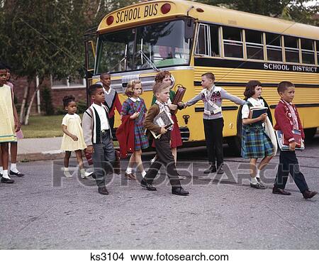 1960S Elementary School Children Cross Street Past Safety Guard With Arms Out Bus Boy Girl View Large Photo Image Picture - 1960S Elementary School Children Cross Street Past Safety Guard With Arms Out Bus Boy Girl. Fotosearch