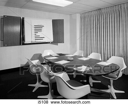 1960s Empty Conference Room With Long Oval Table 7 White Chairs