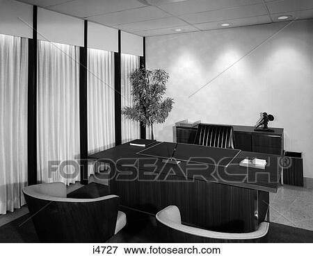 Stock Photo - 1960S Empty Office Interior With Small Tree Roman Statue & 2 Guest Chairs With Wood Veneer On Back . Fotosearch