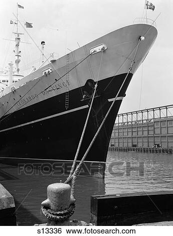 1960S End Of Leonardo Da Vinci Ship Tied Down To Dock With Man Scrubbing Retracted Anchor View Large Photo Image Stock Photograph - 1960S End Of Leonardo Da Vinci Ship Tied Down To Dock With Man Scrubbing Retracted Anchor . Fotosearch