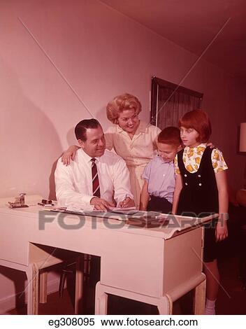 1960S Family Of 4 Around Desk View Large Photo Image Stock Photography - 1960S Family Of 4 Around Desk. Fotosearch