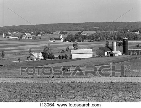 1960S Farm Vista Lancaster County Pa Tractor In Field View Large Photo Image Picture - 1960S Farm Vista Lancaster County Pa Tractor In Field . Fotosearch