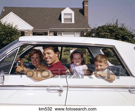 1960S Father And Mother With Son And Daughter In White Four Door Sedan Man Woman Boy Girl Trip Happy Smiling View Large Photo Image Stock Image - 1960S Father And Mother With Son And Daughter In White Four Door Sedan Man Woman Boy Girl Trip Happy Smiling. Fotosearch