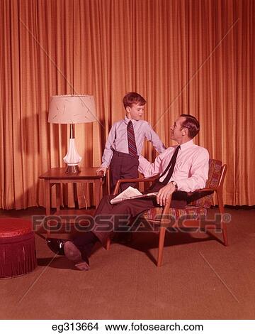 1960S Father And Son Having Conversation View Large Photo Image Picture - 1960S Father And Son Having Conversation. Fotosearch