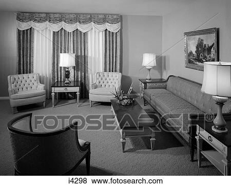 1960S Formal Living Room Interior With Full-Length Drapes Painting With Ornate Gold Frame & Flower Arrangement On Coffee Table View Large Photo Image Stock Photo - 1960S Formal Living Room Interior With Full-Length Drapes Painting With Ornate Gold Frame & Flower Arrangement On Coffee Table. Fotosearch