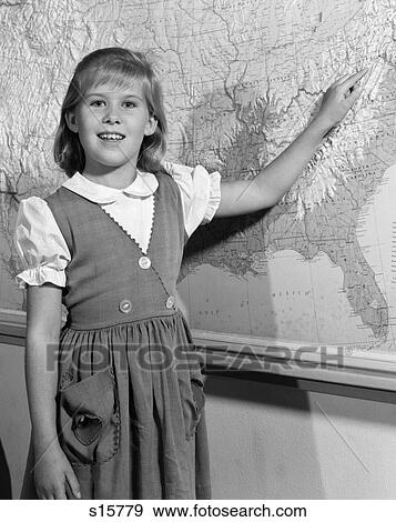 1960S Grade School Girl At Front Of Class Pointing To Map Of United States View Large Photo Image Stock Photo - 1960S Grade School Girl At Front Of Class Pointing To Map Of United States . Fotosearch
