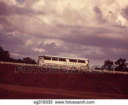 1960S Greyhound Bus On Sloping Road View Large Photo Image Stock Image - 1960S Greyhound Bus On Sloping Road. Fotosearch