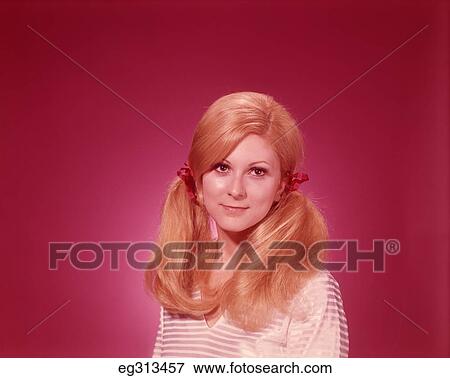 1960S Head And Shoulders Portrait Woman Hair In Pony Tails View Large Photo Image Stock Photo - 1960S Head And Shoulders Portrait Woman Hair In Pony Tails. Fotosearch