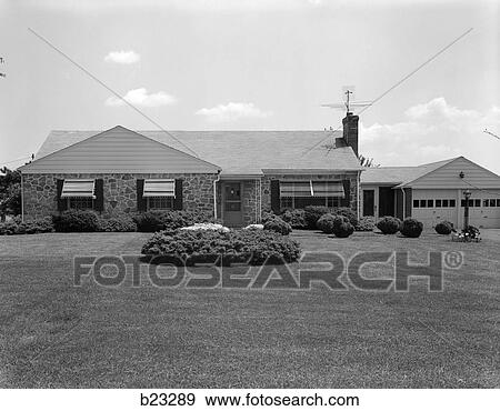 1960S Head On Shot Of Suburban Ranch Style House With Large Front Lawn And 2 Car Garage View Large Photo Image Stock Photo - 1960S Head On Shot Of Suburban Ranch Style House With Large Front Lawn And 2 Car Garage . Fotosearch