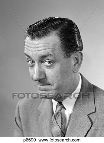 1960S Head & Shoulders Portrait Business Man With Smug Expression Smiling View Large Photo Image Stock Image - 1960S Head & Shoulders Portrait Business Man With Smug Expression Smiling . Fotosearch