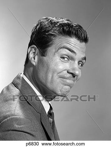1960S Man 3 4 Profile Looking Over Shoulder With Smiling Smug Wacky Facial Expression View Large Photo Image Stock Image - 1960S Man 3 4 Profile Looking Over Shoulder With Smiling Smug Wacky Facial Expression . Fotosearch