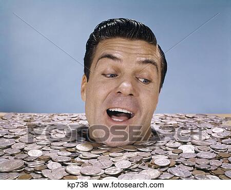 1960S Man Buried Up To His Neck In Coins Money Funny Face Expression View Large Photo Image Stock Photo - 1960S Man Buried Up To His Neck In Coins Money Funny Face Expression. Fotosearch