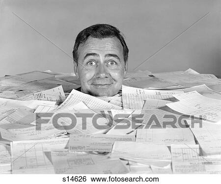 1960S Man Buried Up To His Neck In Paper Bills Expenses Debt Business Forms Drown Smiling Silly Expression On His Face View Large Photo Image Stock Photograph - 1960S Man Buried Up To His Neck In Paper Bills Expenses Debt Business Forms Drown Smiling Silly Expression On His Face . Fotosearch