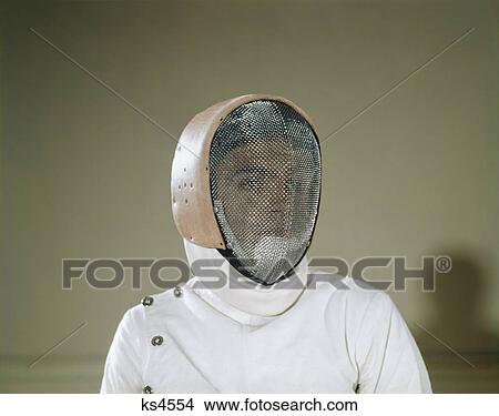 1960S Man Fencer Wearing Protective Screen Mesh Mask Identity Blank Mystery View Large Photo Image Picture - 1960S Man Fencer Wearing Protective Screen Mesh Mask Identity Blank Mystery . Fotosearch