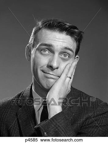 1960S Man Hand To Face Funny Facial Expression Looking Overwhelmed View Large Photo Image Stock Photography - 1960S Man Hand To Face Funny Facial Expression Looking Overwhelmed . Fotosearch