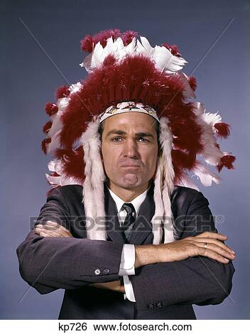1960S Man In Native American Costume Headdress And Suit With Arms Folded Executive Symbolic View Large Photo Image Stock Photograph - 1960S Man In Native American Costume Headdress And Suit With Arms Folded Executive Symbolic . Fotosearch