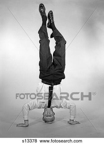 1960S Man In Shirt & Tie Standing On Head View Large Photo Image Stock Photo - 1960S Man In Shirt & Tie Standing On Head . Fotosearch
