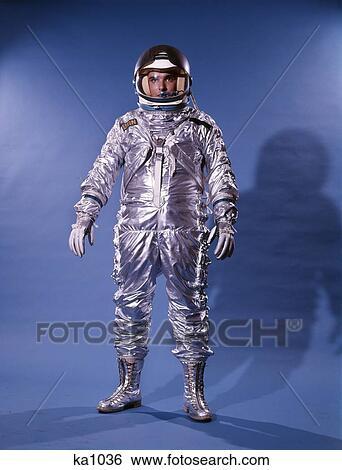 1960'S Man In Silver Astronaut Space Suit And Helmet View Large Photo Image Stock Photograph - 1960'S Man In Silver Astronaut Space Suit And Helmet . Fotosearch