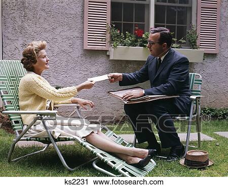 1960S Man Woman Sitting Lawn Chairs Talk Salesman House Window Windowbox Shutter View Large Photo Image Stock Image - 1960S Man Woman Sitting Lawn Chairs Talk Salesman House Window Windowbox Shutter. Fotosearch