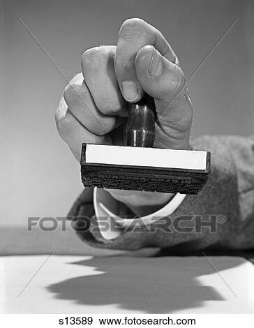 1960S Mans Hand Holding Rubber Stamp Poised About To Stamp Office Equipment Routine Ok O. K. Okay Approval Consent Retro View Large Photo Image Stock Photo - 1960S Mans Hand Holding Rubber Stamp Poised About To Stamp Office Equipment Routine Ok O. K. Okay Approval Consent Retro. Fotosearch