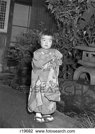 1960S Mari Small Geisha Little Girl In Native Japanese Costume Kimono Robe Obi Tongs Asian Culture View Large Photo Image Stock Image - 1960S Mari Small Geisha Little Girl In Native Japanese Costume Kimono Robe Obi Tongs Asian Culture . Fotosearch