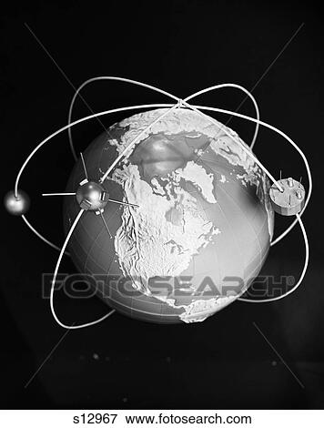 1960S Model Of Earth With 3 Satellites In Orbit Around It View Large Photo Image Stock Photo - 1960S Model Of Earth With 3 Satellites In Orbit Around It . Fotosearch