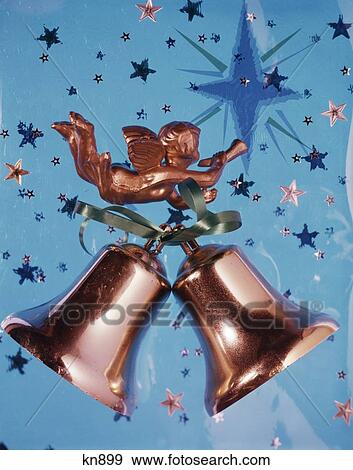 Stock Photo - 1960S New Years Christmas Still Life Blue Background Bells Angel Stars . Fotosearch