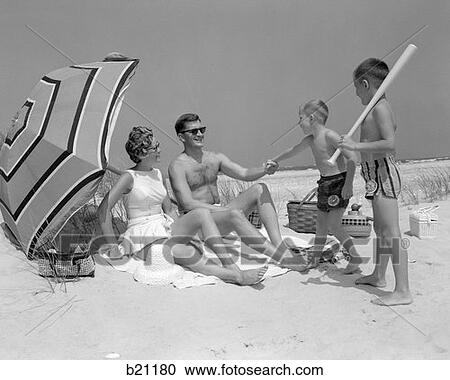 1960S Pair Of Boys With Baseball Bat Trying To Pull Up Father Seated Next To Mother So He Will Play With Them View Large Photo Image Stock Image - 1960S Pair Of Boys With Baseball Bat Trying To Pull Up Father Seated Next To Mother So He Will Play With Them . Fotosearch