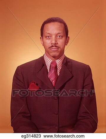 Stock Image - 1960S Portrait African-American Man Wearing Suit. Fotosearch