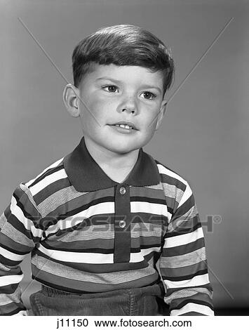 Stock Image - 1960S Portrait Boy Striped Tee Shirt School Portrait Wistful Expression . Fotosearch