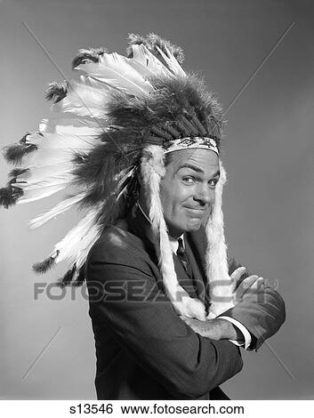 1960S Portrait Man Wearing Indian Chief Feathered Headdress View Large Photo Image Stock Photograph - 1960S Portrait Man Wearing Indian Chief Feathered Headdress . Fotosearch
